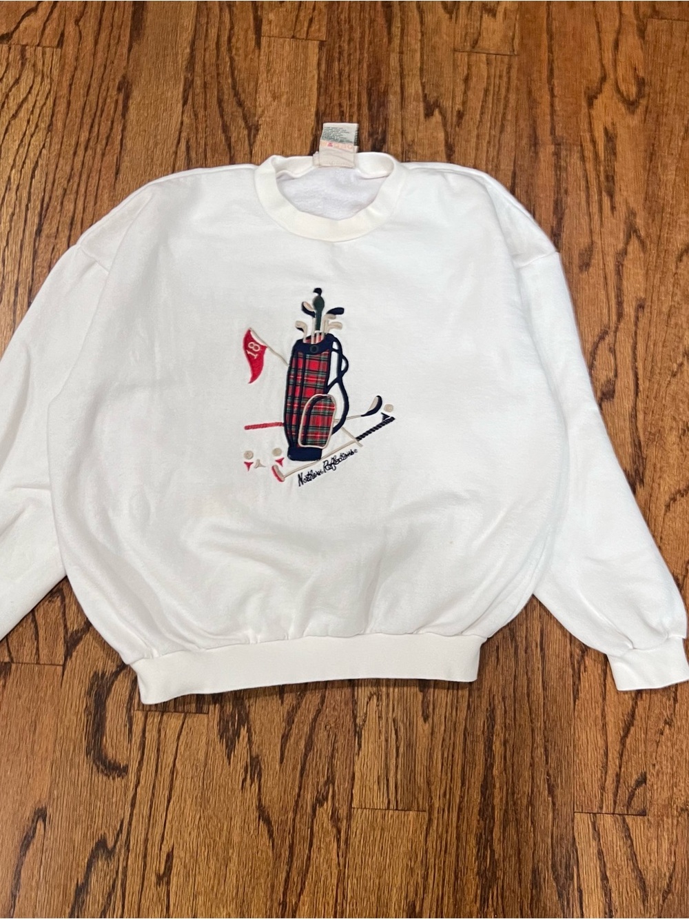 Northern Reflections White Crewneck Sweatshirt with Red & Navy Golf Graphic